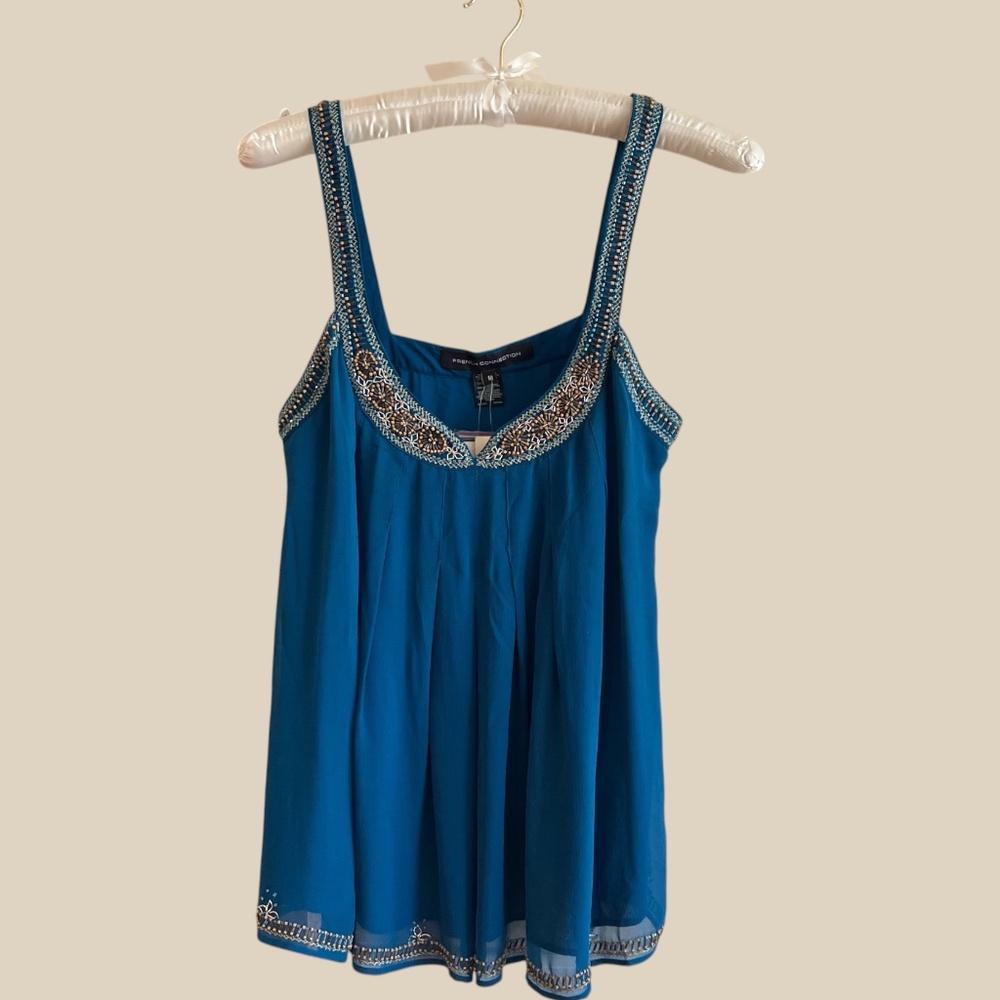 French Connection Size 10 Ocean blue silk camisole with beading throughout.